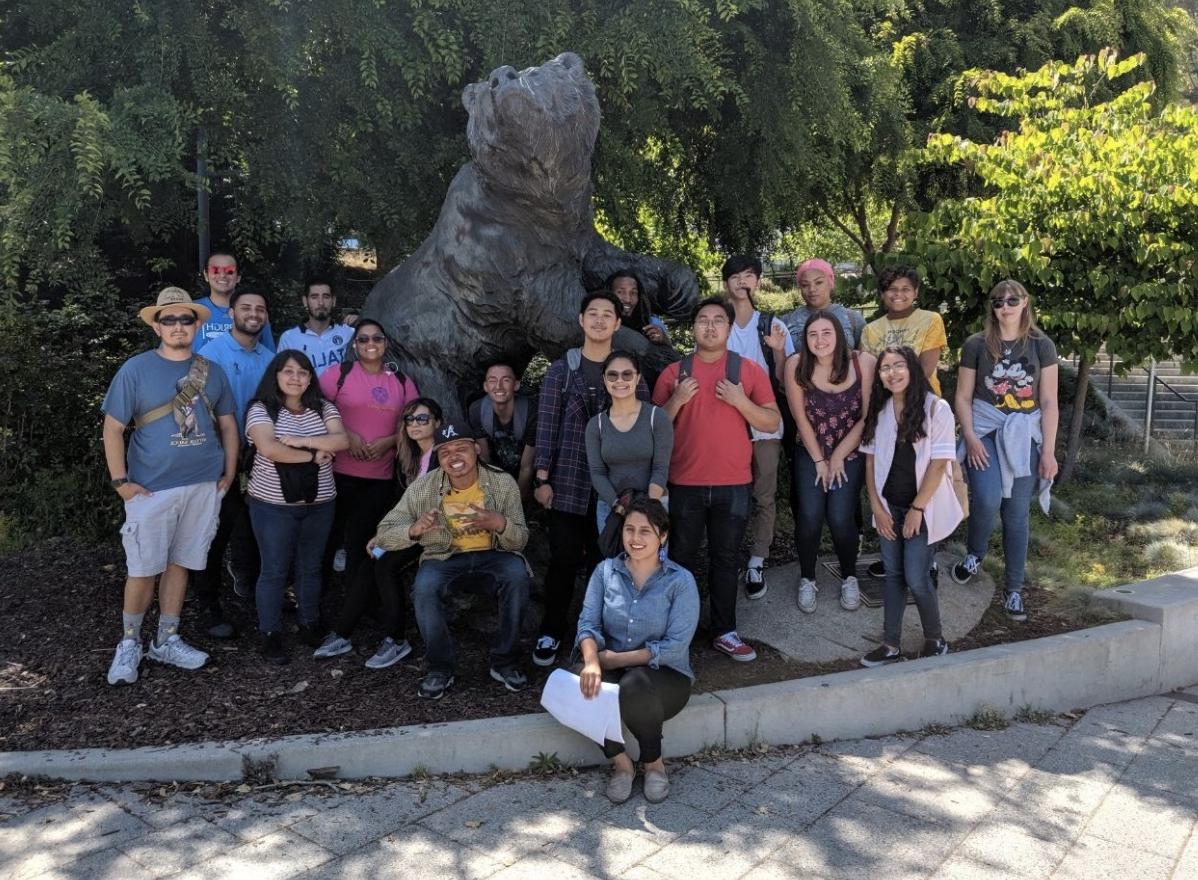 A group of Summer Bridge students poses in front of the UC Berkeley bear